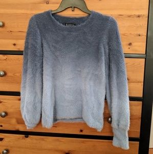 Women's sweater new without tags. Never worn.